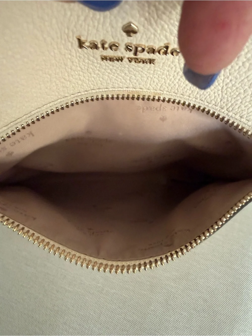 kate spade cream pebbled leather crossbody bag